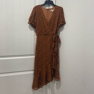 Orange cheetah print dress.